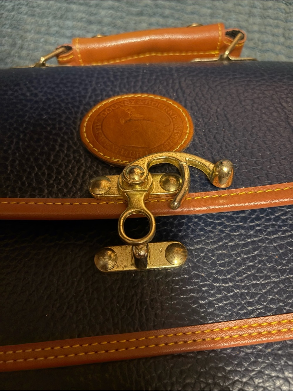 Dooney & Burke Textured Navy Blue Clutch with Tan Trim and Gold Hardware - Picture 7 of 7